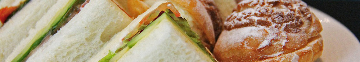 Eating Burger Deli Sandwich at Momma Goldberg's Deli restaurant in Muscle Shoals, AL.